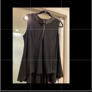 Black sleeveless blouse with silver accents/zipper